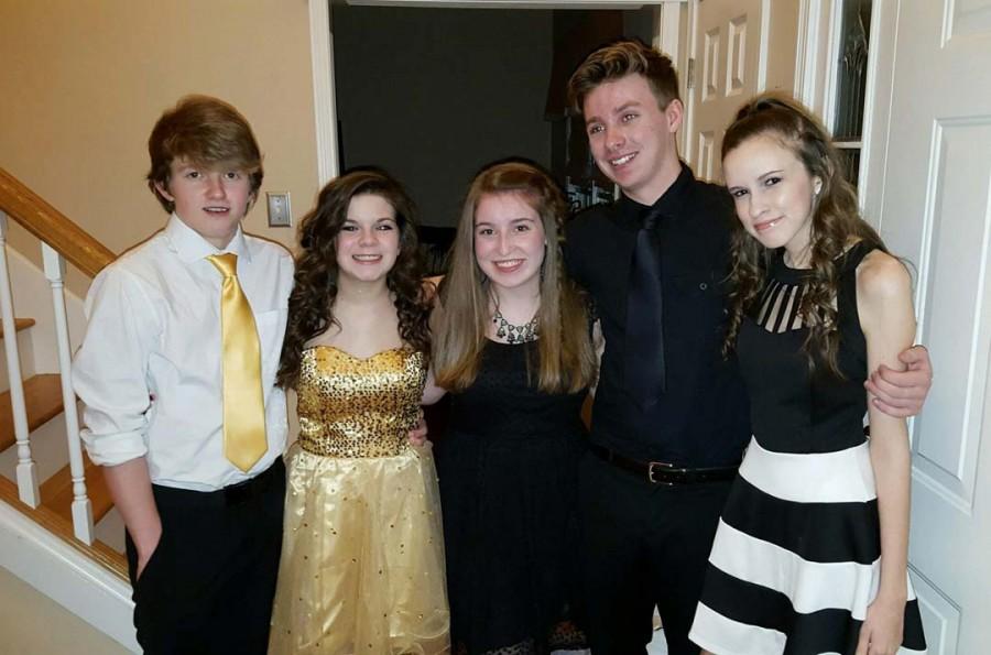 (left to right) Zac Neal, Daryen Hilt, Brooke Waters, Nick Goudie and Marissa King together after preparing to go to Sadie Hawkins. “It was really cool... we partied and danced to the songs.” Waters said. The group ended up having a lot of fun together.