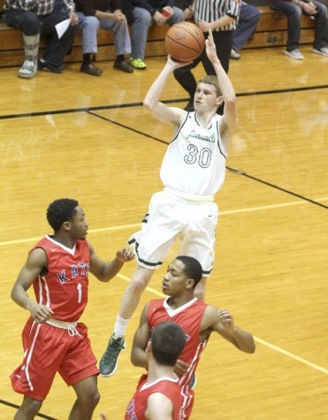 Zionsville Boys Basketball Dominates in First Round of Sectionals